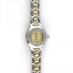 Dámské zdobené hodinky se zlatým číselníkem na kovovém řemínku stříbrno-zlaté barvy..0472 170817 Hodiny