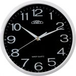 Klasické hodiny PRIM v čistém designu v plastovém provedení s arabskými číslicemi se strojkem s tichým a plynulým chodem..01719 171668 Hodiny