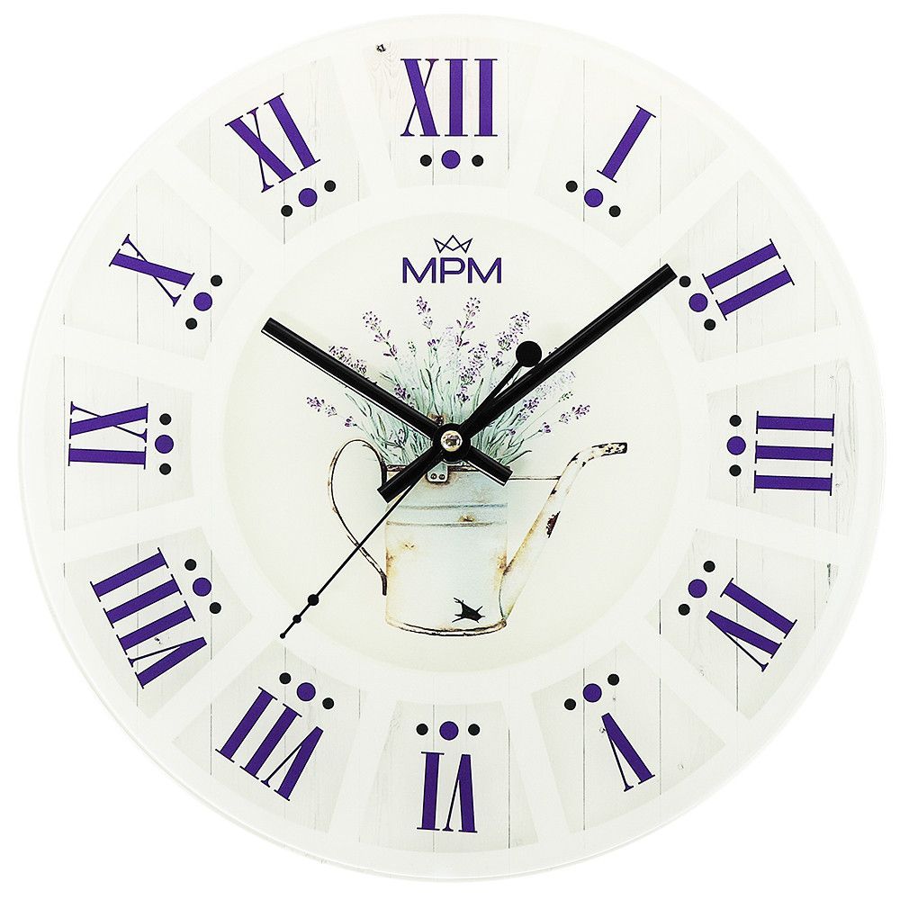 Okouzlující skleněné hodiny MPM Provence jsou dokonalým spojením moderního minimalismu a elegance. Květinový motiv levandulí Vás přenese na francouzský venkov s malebnými lány voňavýc E09.4376